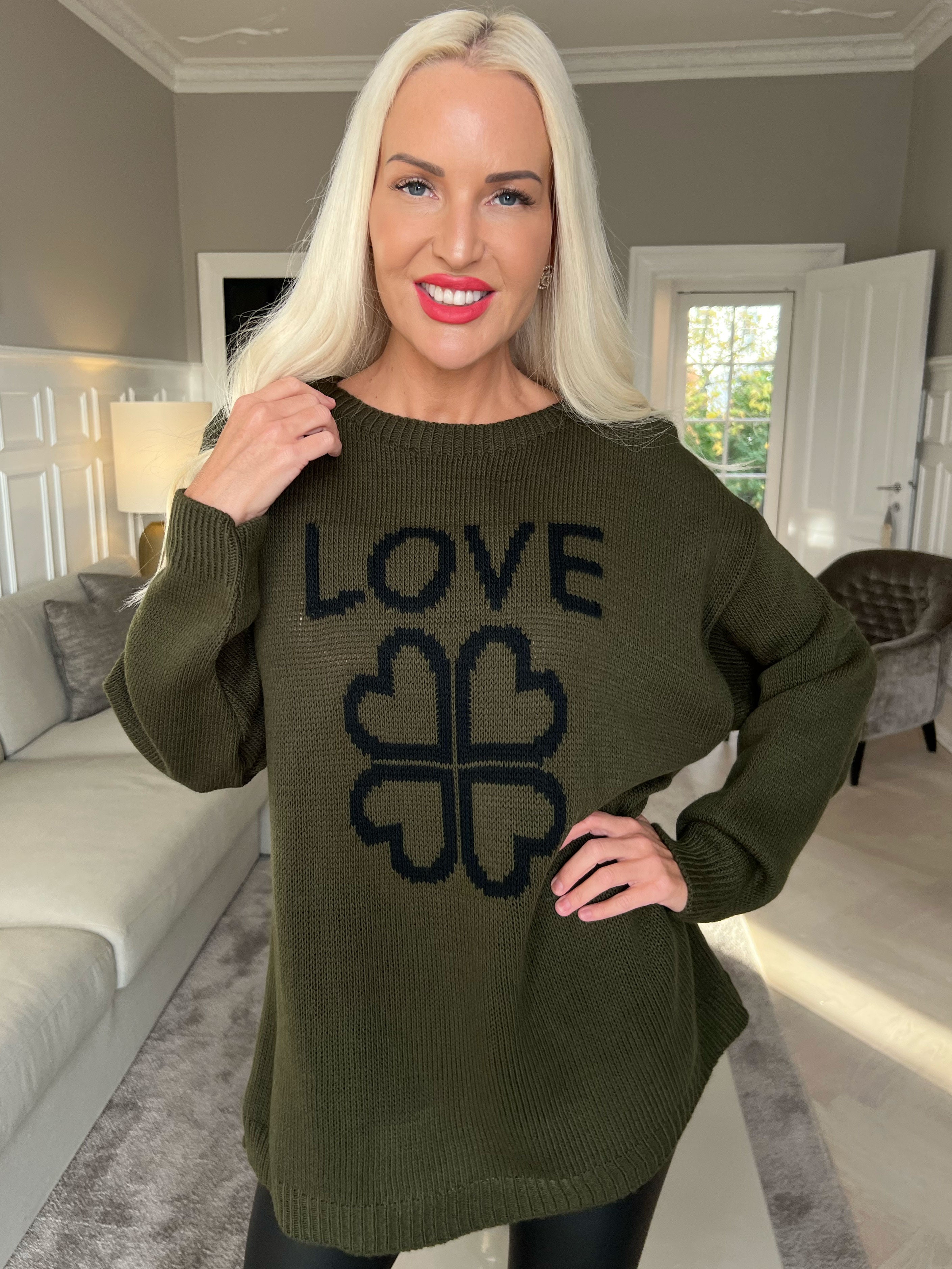 Mia - Strikbluse med firkløver på